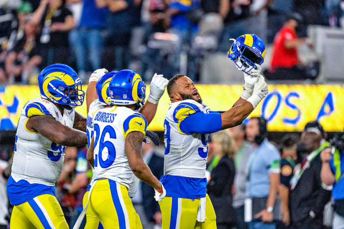 Rams defensive tackle Aaron Donald point to his ring finger after winning the Super Bowl.